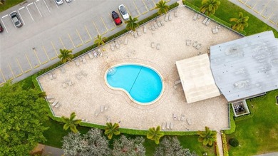 BEAUTIFULLY REMODELED, FIRST FLOOR 2 BEDROOM, 1.5 BATH CONDO on Hillsboro Pines Golf in Florida - for sale on GolfHomes.com, golf home, golf lot