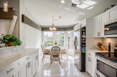 Enjoy beautiful lake views from one of the largest 3 bedroom on PGA National Golf Club in Florida - for sale on GolfHomes.com, golf home, golf lot