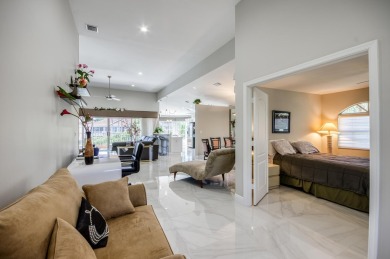 Enjoy beautiful lake views from one of the largest 3 bedroom on PGA National Golf Club in Florida - for sale on GolfHomes.com, golf home, golf lot