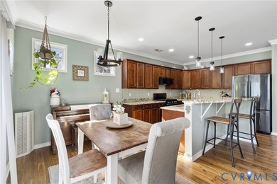 Discover this beautifully maintained 4-bedroom, 3-bath on The Westham Golf Club At Magnolia Green in Virginia - for sale on GolfHomes.com, golf home, golf lot