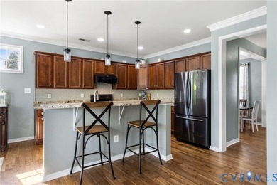 Discover this beautifully maintained 4-bedroom, 3-bath on The Westham Golf Club At Magnolia Green in Virginia - for sale on GolfHomes.com, golf home, golf lot