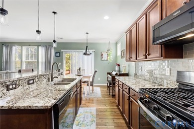 Discover this beautifully maintained 4-bedroom, 3-bath on The Westham Golf Club At Magnolia Green in Virginia - for sale on GolfHomes.com, golf home, golf lot