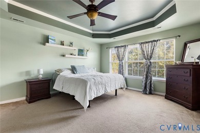 Discover this beautifully maintained 4-bedroom, 3-bath on The Westham Golf Club At Magnolia Green in Virginia - for sale on GolfHomes.com, golf home, golf lot