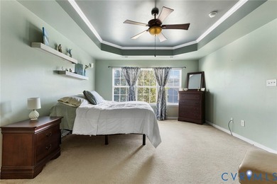 Discover this beautifully maintained 4-bedroom, 3-bath on The Westham Golf Club At Magnolia Green in Virginia - for sale on GolfHomes.com, golf home, golf lot