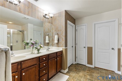 Discover this beautifully maintained 4-bedroom, 3-bath on The Westham Golf Club At Magnolia Green in Virginia - for sale on GolfHomes.com, golf home, golf lot