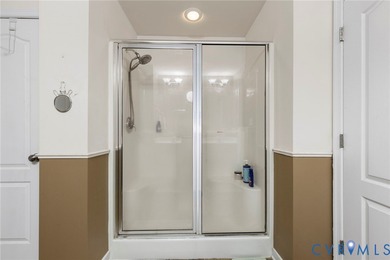 Discover this beautifully maintained 4-bedroom, 3-bath on The Westham Golf Club At Magnolia Green in Virginia - for sale on GolfHomes.com, golf home, golf lot