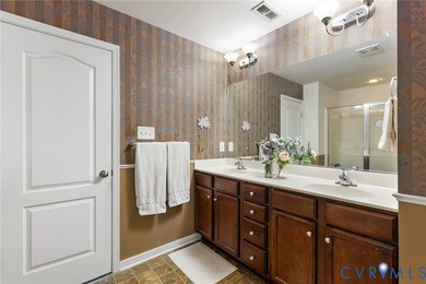 Discover this beautifully maintained 4-bedroom, 3-bath on The Westham Golf Club At Magnolia Green in Virginia - for sale on GolfHomes.com, golf home, golf lot