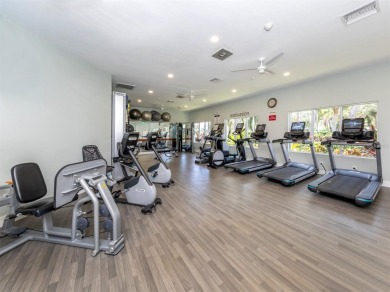This 2,344-square-foot pool home is in the beautiful over on Waterford Golf Club in Florida - for sale on GolfHomes.com, golf home, golf lot