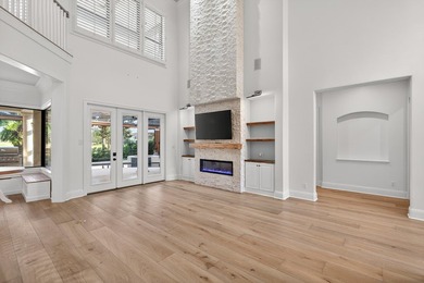 This exquisite home, located on the 15th green of Regatta Bay's on Regatta Bay Golf and Country Club in Florida - for sale on GolfHomes.com, golf home, golf lot