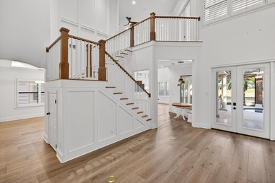 This exquisite home, located on the 15th green of Regatta Bay's on Regatta Bay Golf and Country Club in Florida - for sale on GolfHomes.com, golf home, golf lot