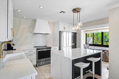 Experience luxurious living in this beautifully renovated 2nd on Quail Ridge Golf Course and Country Club in Florida - for sale on GolfHomes.com, golf home, golf lot