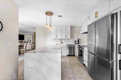 Experience luxurious living in this beautifully renovated 2nd on Quail Ridge Golf Course and Country Club in Florida - for sale on GolfHomes.com, golf home, golf lot