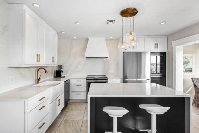 Experience luxurious living in this beautifully renovated 2nd on Quail Ridge Golf Course and Country Club in Florida - for sale on GolfHomes.com, golf home, golf lot