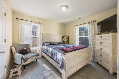 This charming Cape Cod features luxury vinyl plank flooring in on Oceanview Golf Course in Virginia - for sale on GolfHomes.com, golf home, golf lot