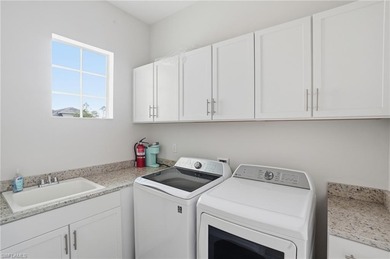 Impeccable 3-Bedroom + Den Home with Golf and Lake Views in on Babcock National Golf Course in Florida - for sale on GolfHomes.com, golf home, golf lot