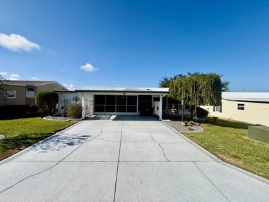 Home is located in Water Oak Country Club Estates in Lady Lake on Water Oak Country Club Estates in Florida - for sale on GolfHomes.com, golf home, golf lot