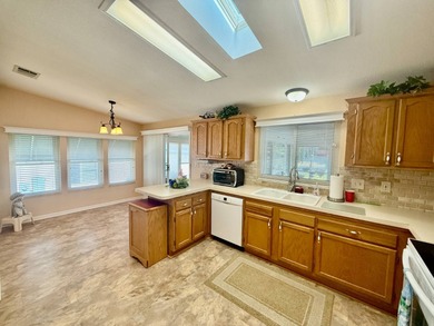 Home is located in Water Oak Country Club Estates in Lady Lake on Water Oak Country Club Estates in Florida - for sale on GolfHomes.com, golf home, golf lot