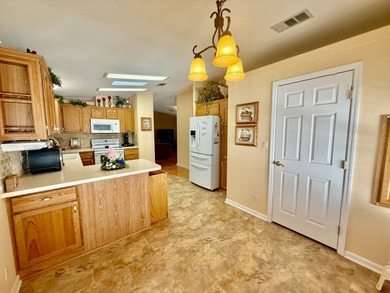 Home is located in Water Oak Country Club Estates in Lady Lake on Water Oak Country Club Estates in Florida - for sale on GolfHomes.com, golf home, golf lot