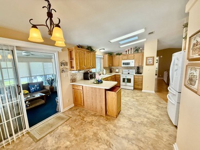 Home is located in Water Oak Country Club Estates in Lady Lake on Water Oak Country Club Estates in Florida - for sale on GolfHomes.com, golf home, golf lot