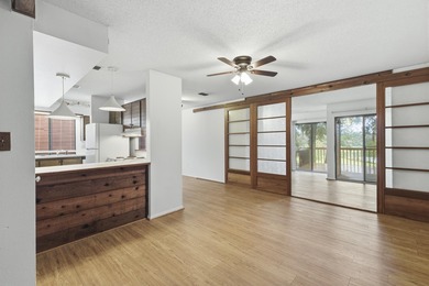 Overlook a golf course/pond in this ultra contemporary condo // on Hilaman Park Golf Course in Florida - for sale on GolfHomes.com, golf home, golf lot