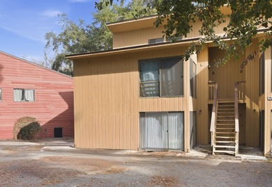 Overlook a golf course/pond in this ultra contemporary condo // on Hilaman Park Golf Course in Florida - for sale on GolfHomes.com, golf home, golf lot