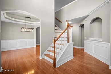 Spacious 5-bedroom, 3.5-bath home in the desirable gated Island on Island West Golf Club in South Carolina - for sale on GolfHomes.com, golf home, golf lot