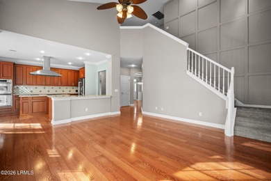 Spacious 5-bedroom, 3.5-bath home in the desirable gated Island on Island West Golf Club in South Carolina - for sale on GolfHomes.com, golf home, golf lot