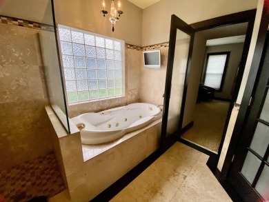 STUNNING HOME WITH WATER & GOLF COURSE VIEWS-YOUR EVERYDAY on Sandpiper Bay Golf and Country Club in North Carolina - for sale on GolfHomes.com, golf home, golf lot