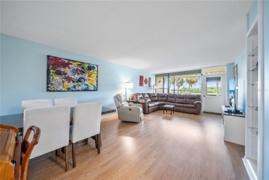 This beautifully updated two-bedroom, two-bath condo in the on Cove Cay Country Club in Florida - for sale on GolfHomes.com, golf home, golf lot