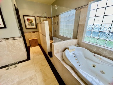 STUNNING HOME WITH WATER & GOLF COURSE VIEWS-YOUR EVERYDAY on Sandpiper Bay Golf and Country Club in North Carolina - for sale on GolfHomes.com, golf home, golf lot