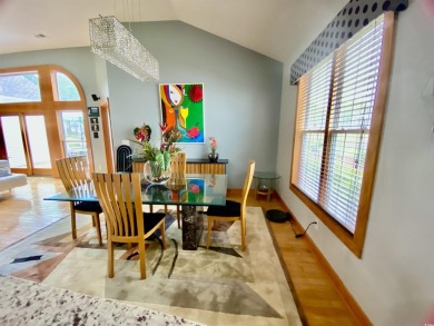 STUNNING HOME WITH WATER & GOLF COURSE VIEWS-YOUR EVERYDAY on Sandpiper Bay Golf and Country Club in North Carolina - for sale on GolfHomes.com, golf home, golf lot