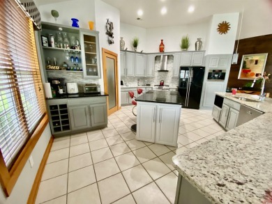 STUNNING HOME WITH WATER & GOLF COURSE VIEWS-YOUR EVERYDAY on Sandpiper Bay Golf and Country Club in North Carolina - for sale on GolfHomes.com, golf home, golf lot