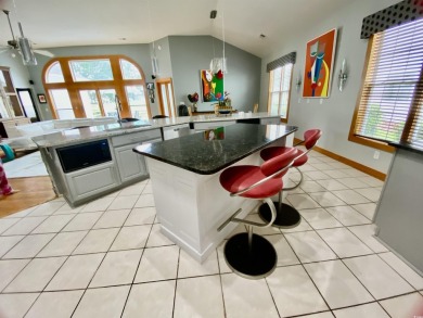 STUNNING HOME WITH WATER & GOLF COURSE VIEWS-YOUR EVERYDAY on Sandpiper Bay Golf and Country Club in North Carolina - for sale on GolfHomes.com, golf home, golf lot