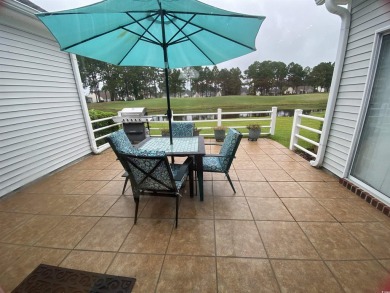 STUNNING HOME WITH WATER & GOLF COURSE VIEWS-YOUR EVERYDAY on Sandpiper Bay Golf and Country Club in North Carolina - for sale on GolfHomes.com, golf home, golf lot