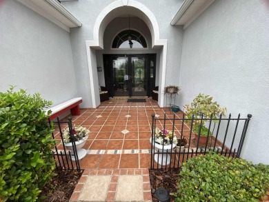 STUNNING HOME WITH WATER & GOLF COURSE VIEWS-YOUR EVERYDAY on Sandpiper Bay Golf and Country Club in North Carolina - for sale on GolfHomes.com, golf home, golf lot