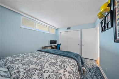 This beautifully updated two-bedroom, two-bath condo in the on Cove Cay Country Club in Florida - for sale on GolfHomes.com, golf home, golf lot