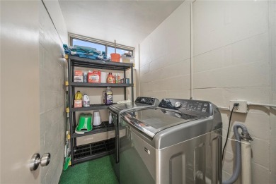 This beautifully updated two-bedroom, two-bath condo in the on Cove Cay Country Club in Florida - for sale on GolfHomes.com, golf home, golf lot