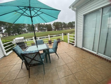STUNNING HOME WITH WATER & GOLF COURSE VIEWS-YOUR EVERYDAY on Sandpiper Bay Golf and Country Club in North Carolina - for sale on GolfHomes.com, golf home, golf lot