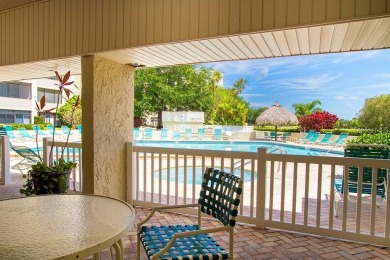 This beautifully updated two-bedroom, two-bath condo in the on Cove Cay Country Club in Florida - for sale on GolfHomes.com, golf home, golf lot