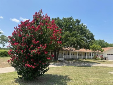 WATERFRONT ESTATE  1.2 Acres, 5 Bedroom, 3.5 Bathrooms on on Nocona Hills Golf Course in Texas - for sale on GolfHomes.com, golf home, golf lot