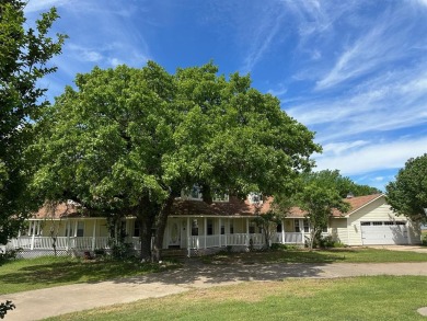 WATERFRONT ESTATE  1.2 Acres, 5 Bedroom, 3.5 Bathrooms on on Nocona Hills Golf Course in Texas - for sale on GolfHomes.com, golf home, golf lot