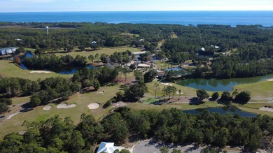 Experience golf community living on this beautifully wooded lot on St. James Bay in Florida - for sale on GolfHomes.com, golf home, golf lot