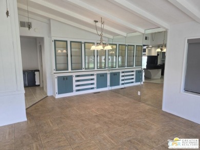Come see this 2bed/2bath 1440 sq ft home with an open, easy flow on Date Palm Country Club in California - for sale on GolfHomes.com, golf home, golf lot