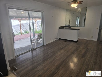 Come see this 2bed/2bath 1440 sq ft home with an open, easy flow on Date Palm Country Club in California - for sale on GolfHomes.com, golf home, golf lot