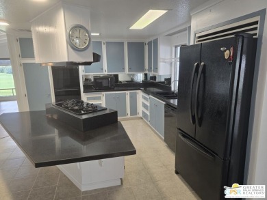 Come see this 2bed/2bath 1440 sq ft home with an open, easy flow on Date Palm Country Club in California - for sale on GolfHomes.com, golf home, golf lot