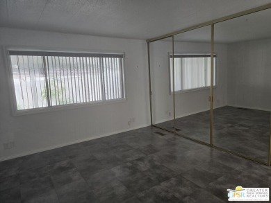 Come see this 2bed/2bath 1440 sq ft home with an open, easy flow on Date Palm Country Club in California - for sale on GolfHomes.com, golf home, golf lot
