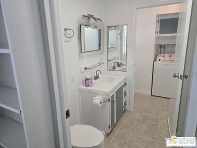 Come see this 2bed/2bath 1440 sq ft home with an open, easy flow on Date Palm Country Club in California - for sale on GolfHomes.com, golf home, golf lot