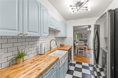 Welcome to this 3-bedroom, 3.5-bath end-unit townhome on Heather Hills Golf Course in North Carolina - for sale on GolfHomes.com, golf home, golf lot