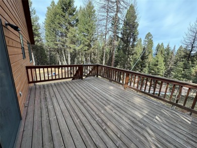 3 Bedroom, 2 Bathroom home on 2.66 acres in the highly desirable on Double Arrow Lodge in Montana - for sale on GolfHomes.com, golf home, golf lot