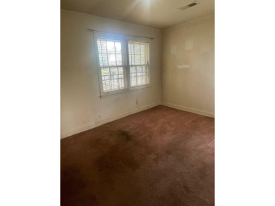 Charming 2-bedroom, 1-bath home with direct backyard access to on Pine Hill Golf Course in Tennessee - for sale on GolfHomes.com, golf home, golf lot